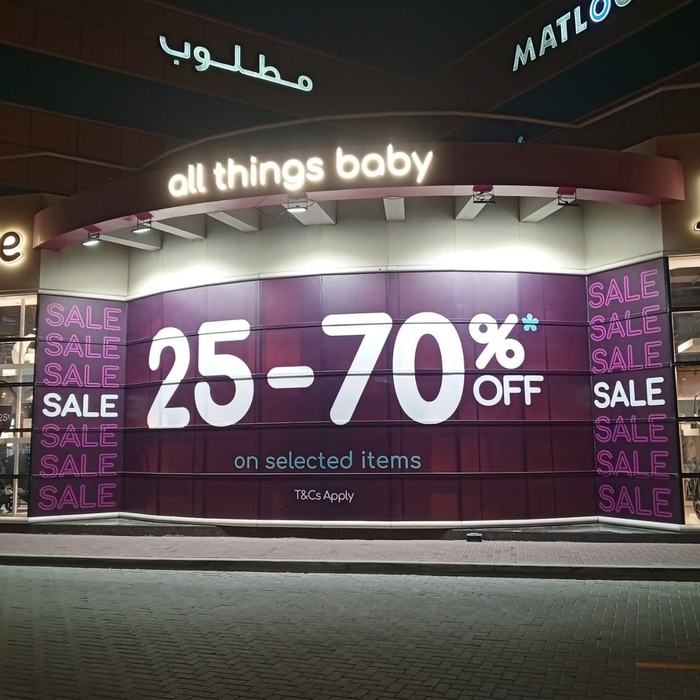 All Things Baby sale hoarding graphics in a Dubai mall