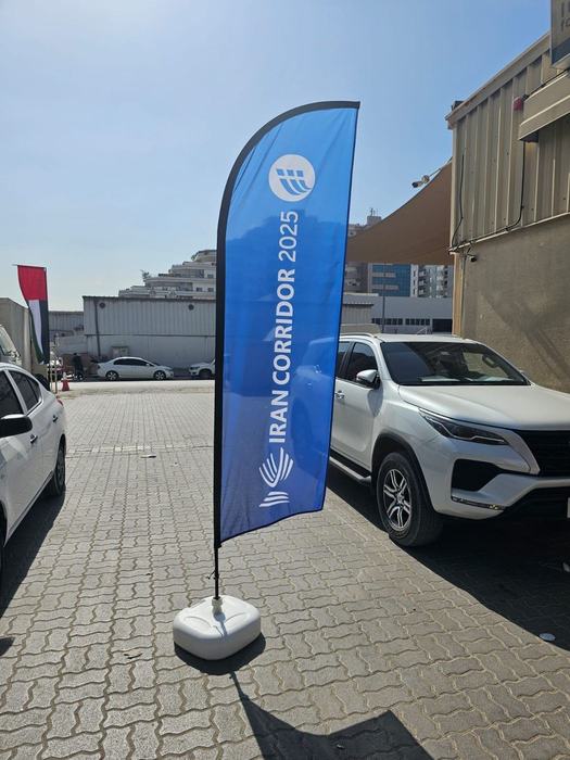 Blue feather flag outside a venue