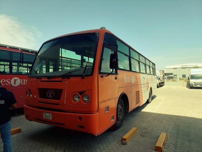 Homes R Us staff bus branding in Dubai