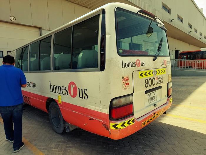 Homes R Us staff bus rear branding