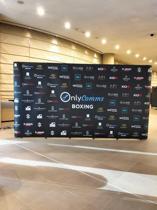 OnlyComms boxing step and repeat backdrop