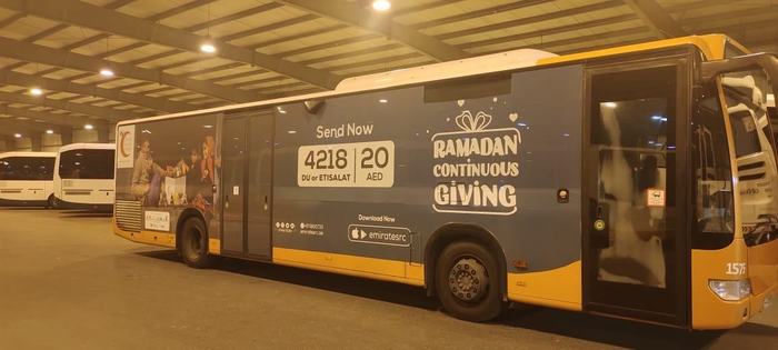 Ramadan Continuous Giving campaign bus advertising wrap in Dubai