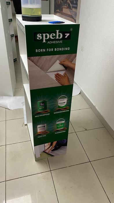 Speb adhesive branded product display stand
