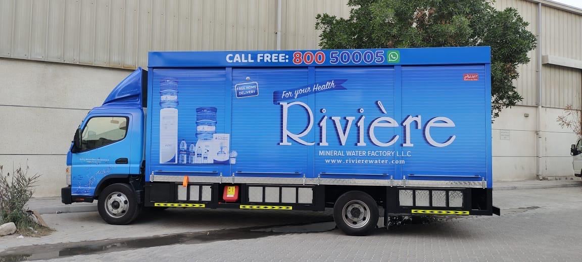 Rivière mineral water truck box branding