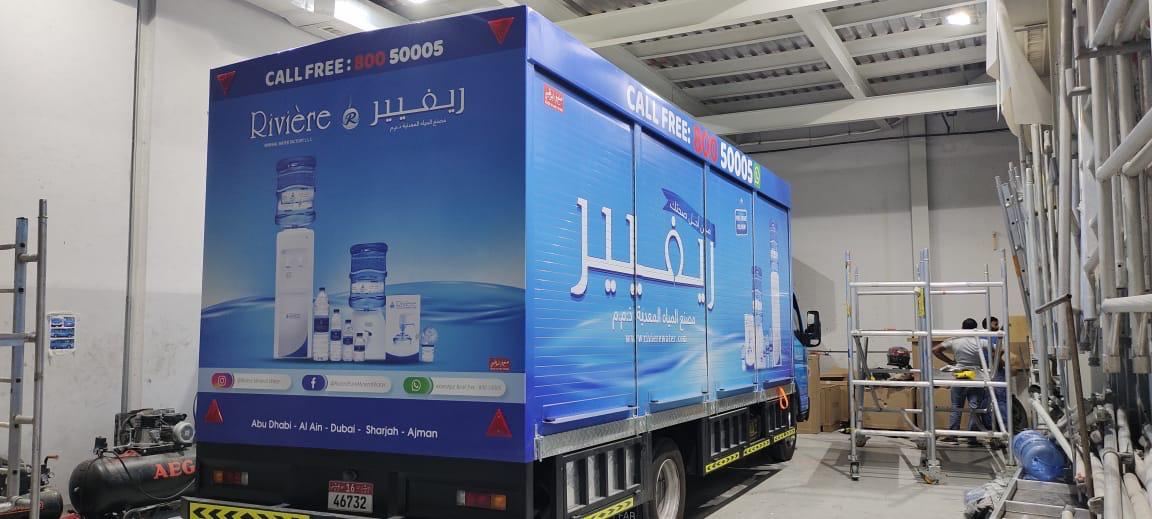 Rivière water truck box graphics
