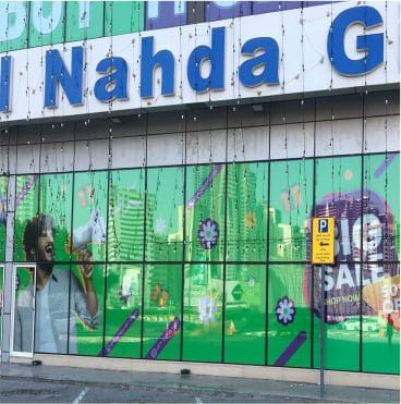 Sale window graphics on a retail glass front