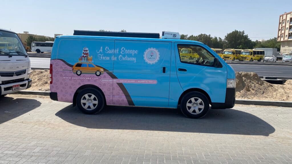 Illustrated holiday tour van wrap in Dubai